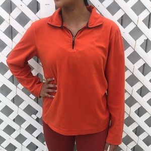 orange half zip